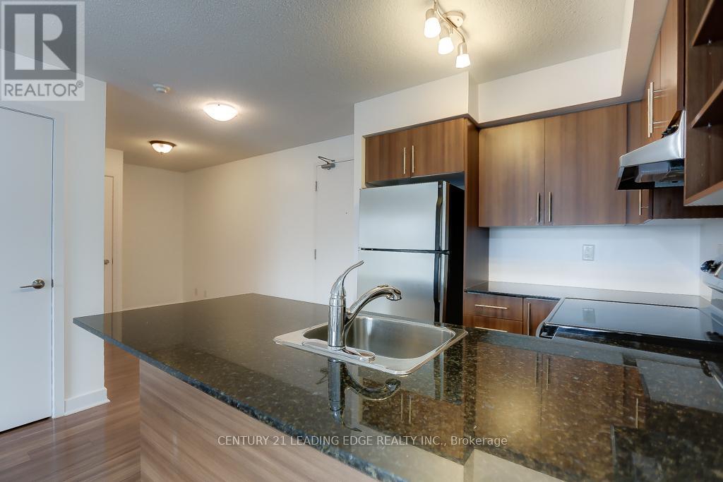 321 - 120 Dallimore Circle, Toronto, Ontario  M3C 4J1 - Photo 5 - C12929928