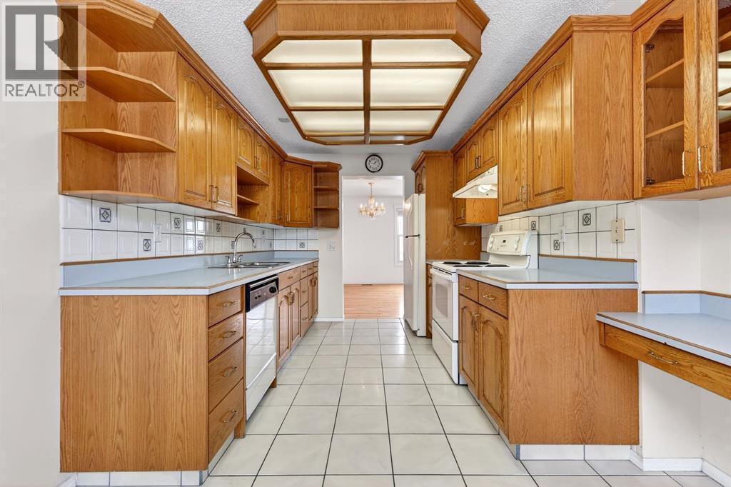 115 Abingdon Court Ne, Calgary, Alberta  T2A 6S4 - Photo 5 - A2286821