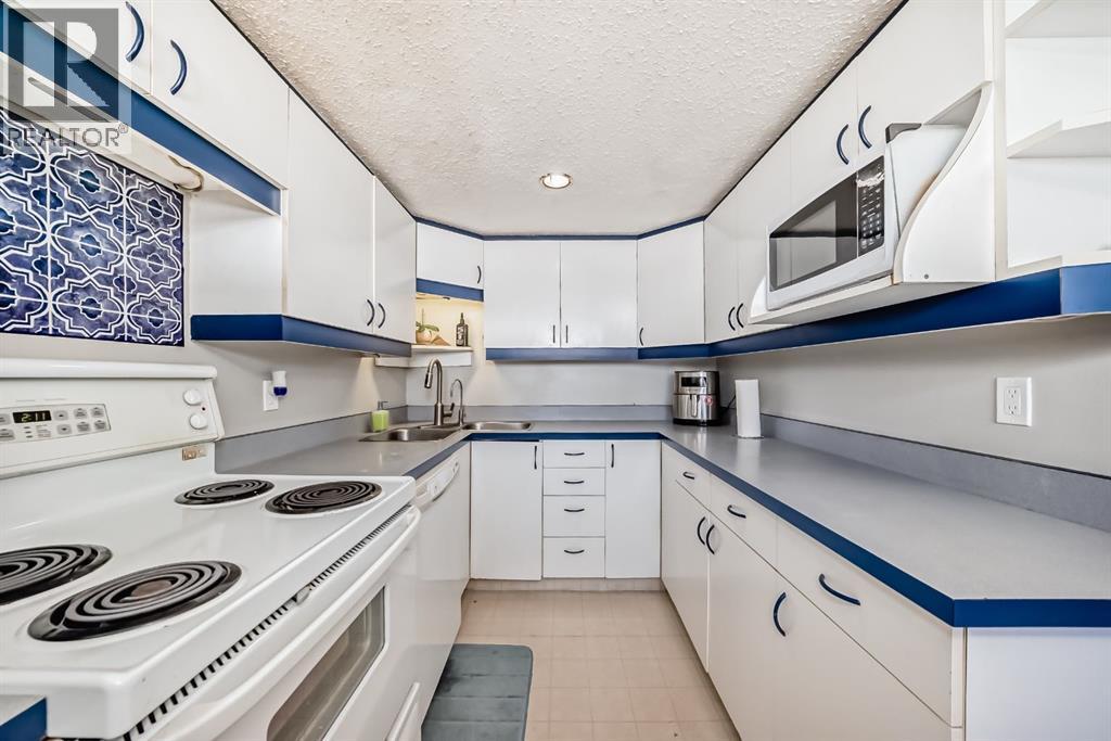 702, 9930 Bonaventure Drive SE, Calgary, Alberta  T2J 4L4 - Photo 2 - A2296673