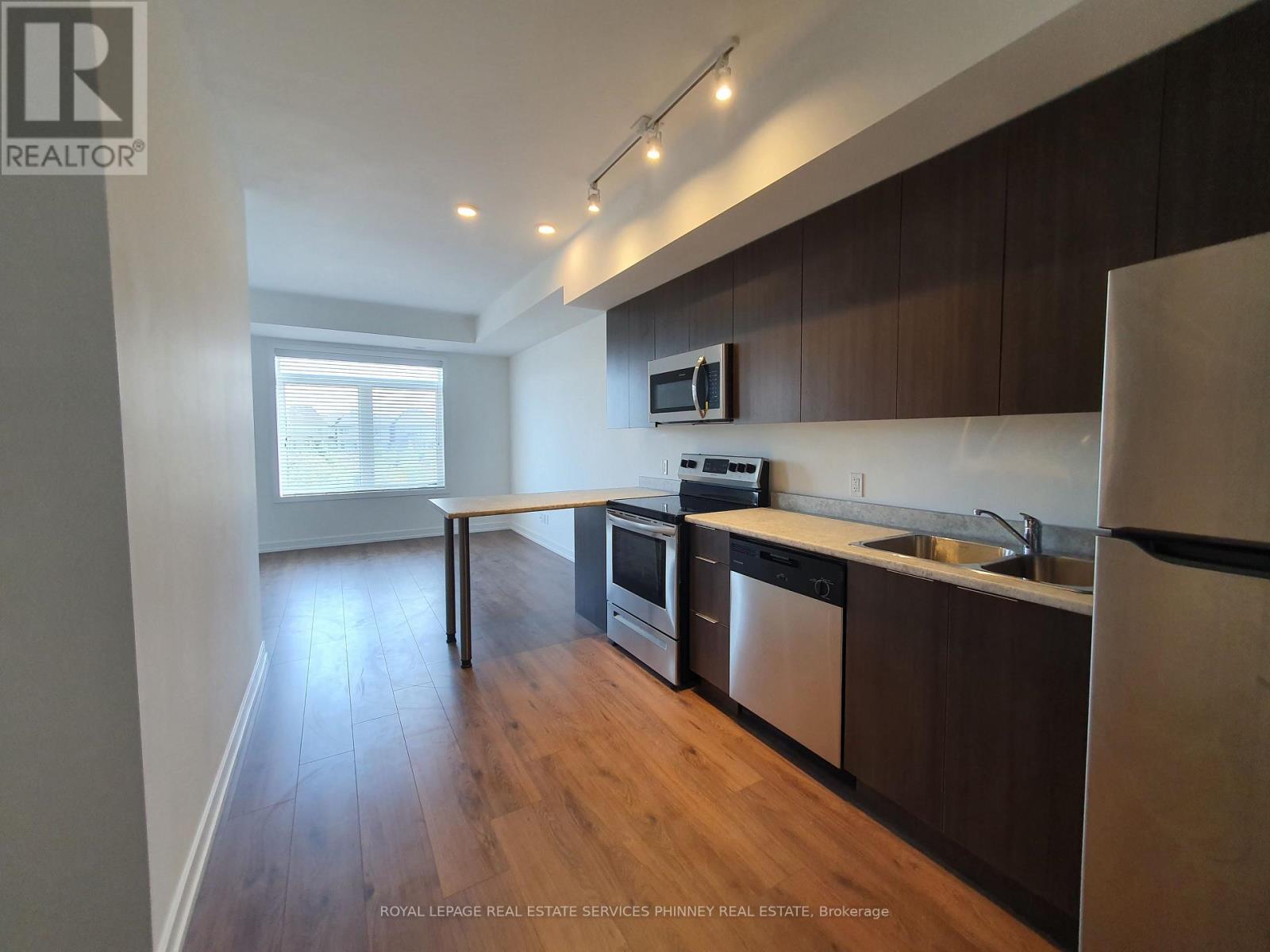 325 - 3078 Sixth Line, Oakville, Ontario  L6M 4J9 - Photo 3 - W12929912