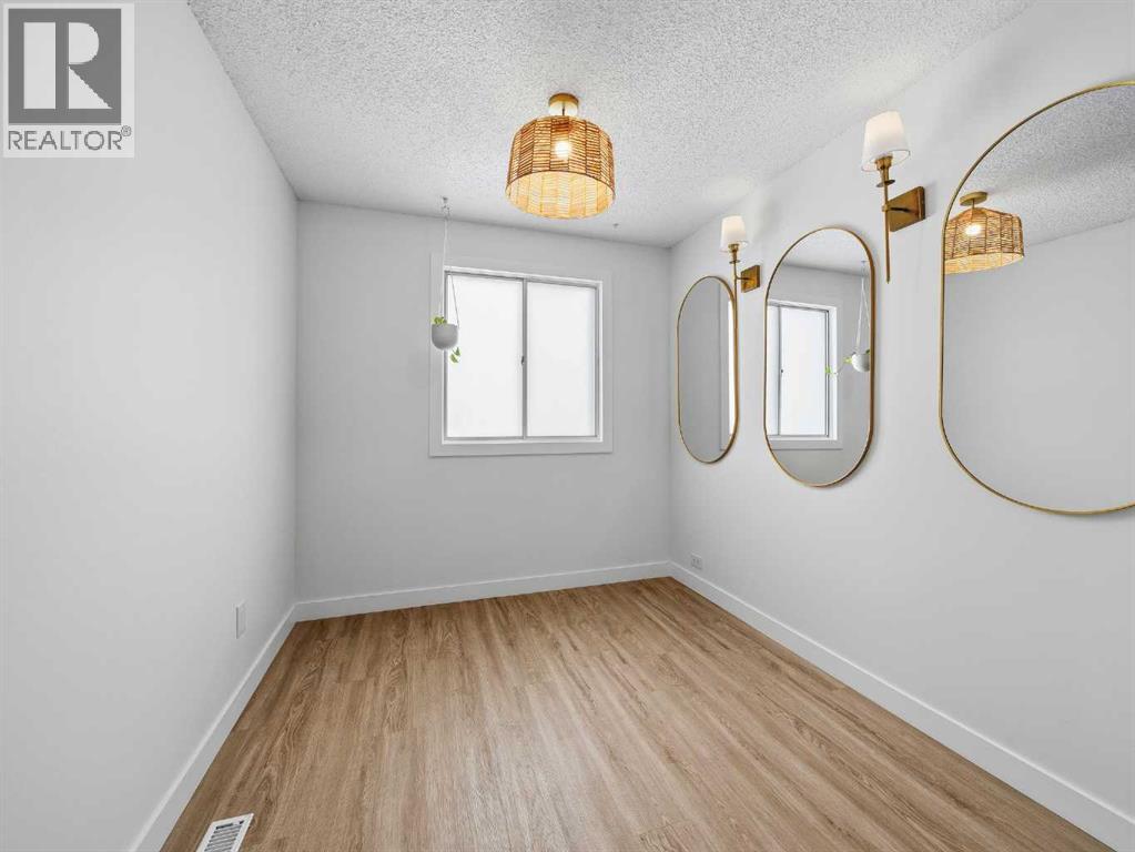 7723 Hunterview Drive Nw, Calgary, Alberta  T2K 5C9 - Photo 19 - A2296844