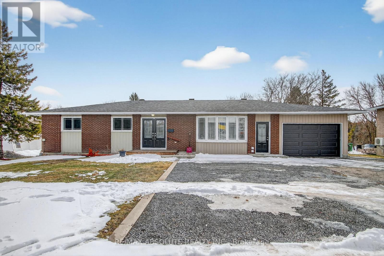 ** OPEN HOUSE SUNDAY APRIL 19TH FROM 2:00 P.M. TO 4:00 P.M.** Impeccably renovated waterfront bungalow in the heart of Embrun! This exceptional property features an in-ground pool, a covered outdoor kitchen, and a separate in-law suite, offering the perfect blend of comfort, functionality, and country charm. Ideally located within walking distance to grocery stores, the sports dome, the recreation centre, and bike trails. The bright main level offers a sun-filled formal dining room, a warm sunken living room, and a stunning kitchen with a large quartz island, stainless steel appliances, cooktop, abundant cabinetry, and a dedicated coffee bar. Expansive windows overlook the waterfront backyard and provide direct access to the outdoor space. Extensive custom cabinetry is featured throughout the main level, including the dining, living, office, and primary bedroom with a full wall of closets, offering exceptional storage. This level also includes two generously sized bedrooms, a versatile office/den-ideal for a home office or small business-and a 5-piece bathroom. The fully finished lower level boasts a spacious recreation room with a wet bar, a laundry room with wall-to-wall cabinetry and a hang-dry station, a mechanical/storage room, cold storage, and a 4-piece bathroom. The separate entrance in-law suite includes a kitchen, living area, bedroom, and 4-piece bathroom-perfect for multi-generational living or home-based business use. Outside, enjoy a private oasis with an extensive interlock patio, a well-maintained in-ground pool, an outdoor shower, and a garden shed. The covered all-cedar cathedral outdoor kitchen features granite countertops, sink, fridge, searing bar, built-in DCS BBQ with rotisserie and gas burner (natural gas), and stainless steel cabinetry. A generously sized heated garage completes this outstanding property. (id:48254)