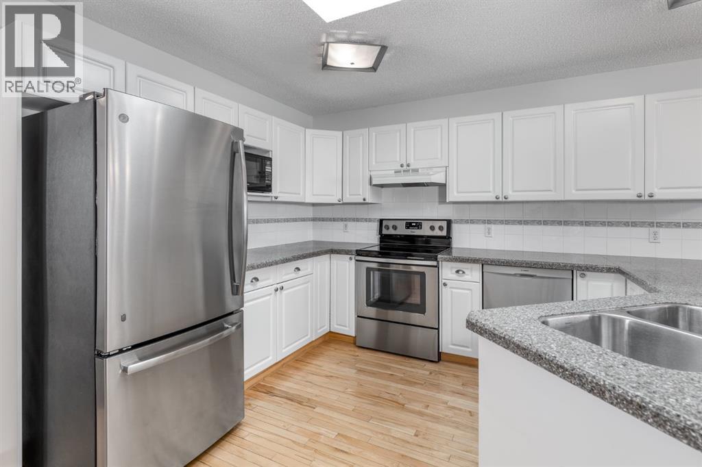 108 Quigley Close, Cochrane, Alberta  T4C 1S4 - Photo 6 - A2292444