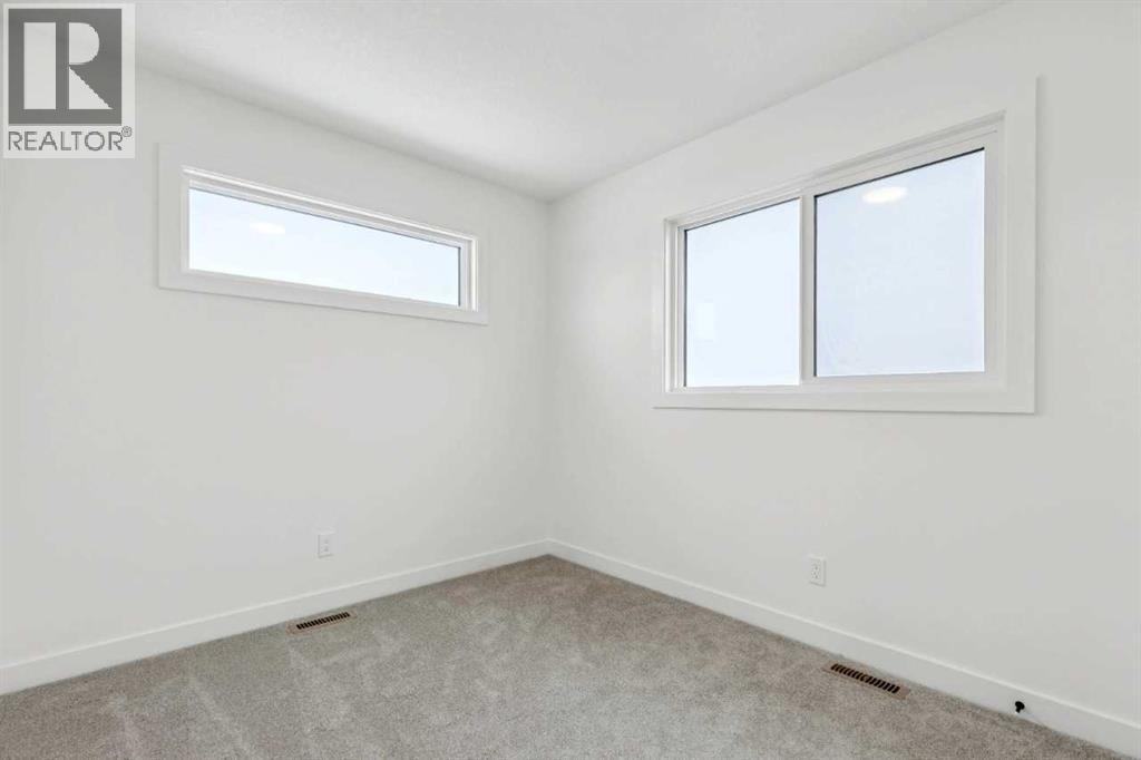 116 Amblefield Grove Nw, Calgary, Alberta  T3P 2L4 - Photo 38 - A2280541