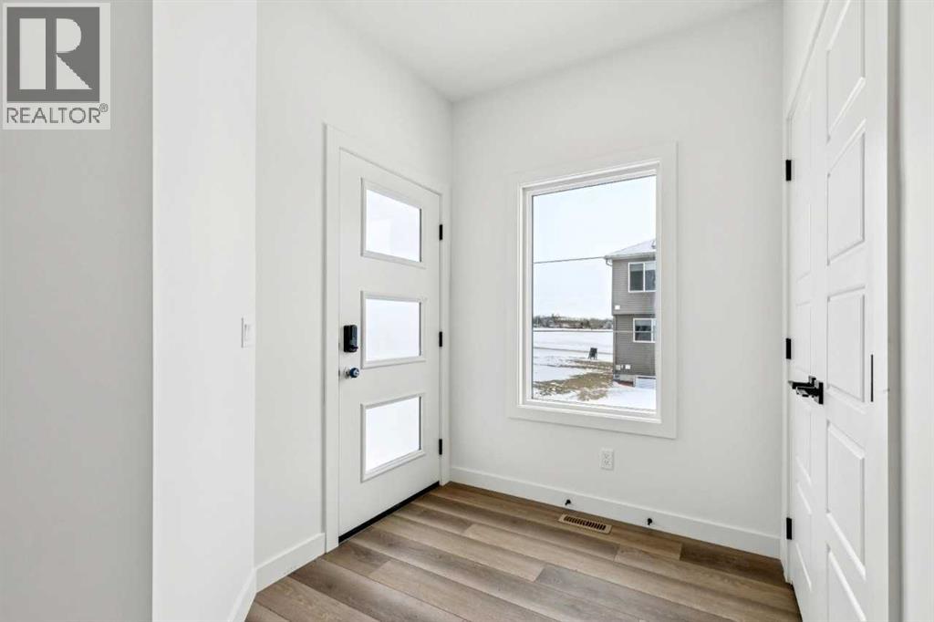 116 Amblefield Grove Nw, Calgary, Alberta  T3P 2L4 - Photo 5 - A2280541