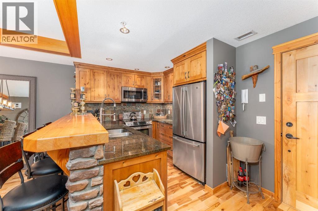 2207, 101b Stewart Creek Landing, Canmore, Alberta  T1W 0E3 - Photo 2 - A2293258