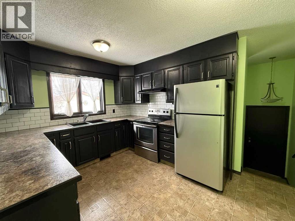 5112 55 Ave, Ponoka, Alberta  T4J 1G8 - Photo 6 - A2296483