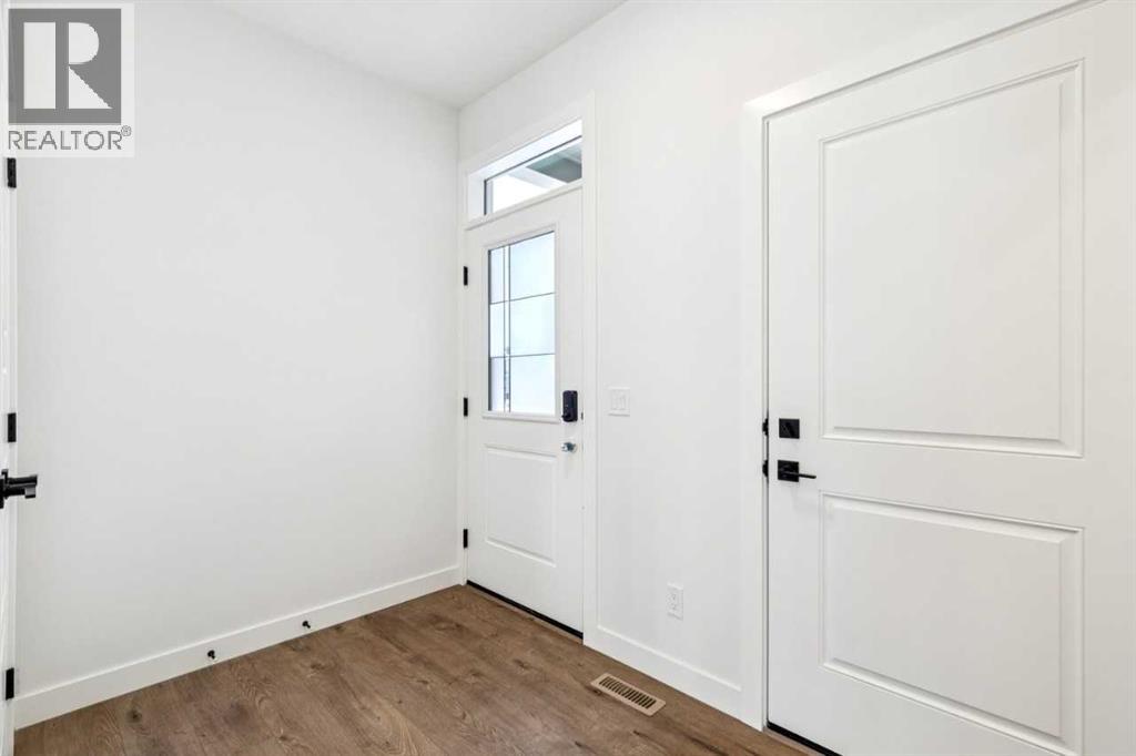 534 Hotchkiss Manor, Calgary, Alberta  T3S 0T2 - Photo 3 - A2288974