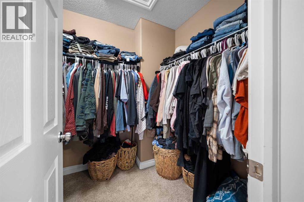 173 Cimarron Park Circle, Okotoks, Alberta  T1S 2H5 - Photo 32 - A2295668