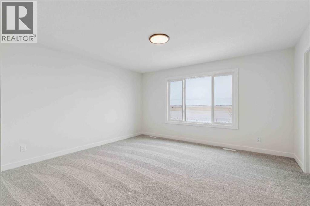 190 Northern Lights Crescent, Langdon, Alberta  T0J 1X2 - Photo 24 - A2272636