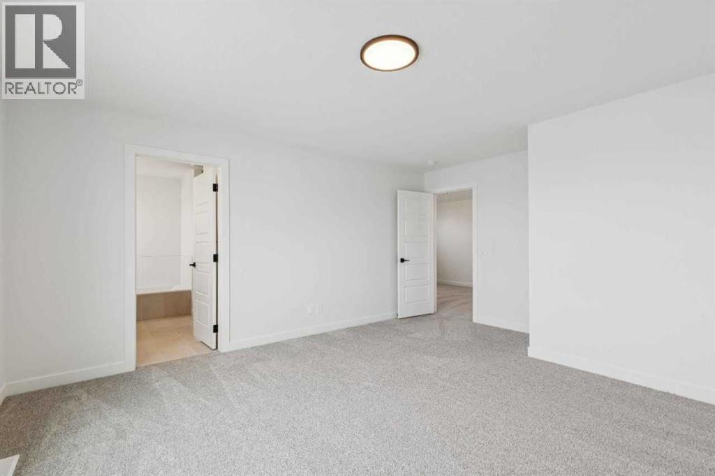 190 Northern Lights Crescent, Langdon, Alberta  T0J 1X2 - Photo 26 - A2272636