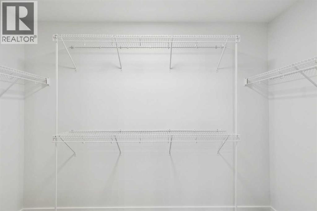 190 Northern Lights Crescent, Langdon, Alberta  T0J 1X2 - Photo 31 - A2272636