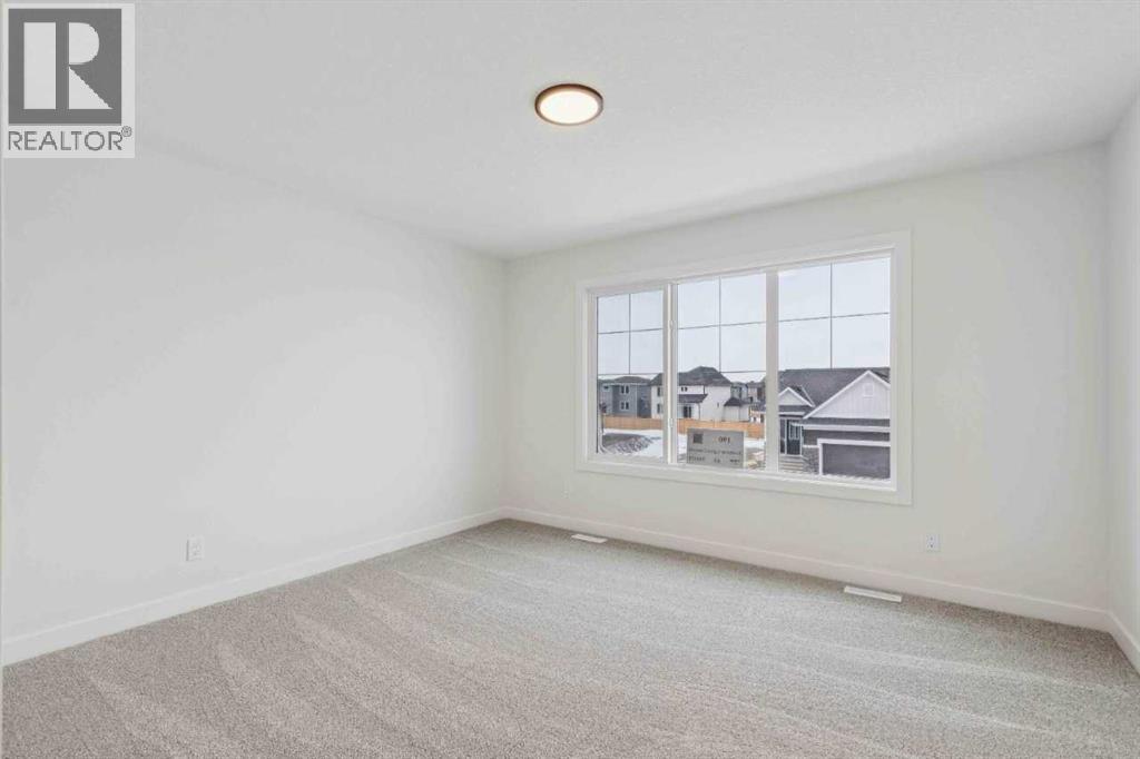 190 Northern Lights Crescent, Langdon, Alberta  T0J 1X2 - Photo 32 - A2272636