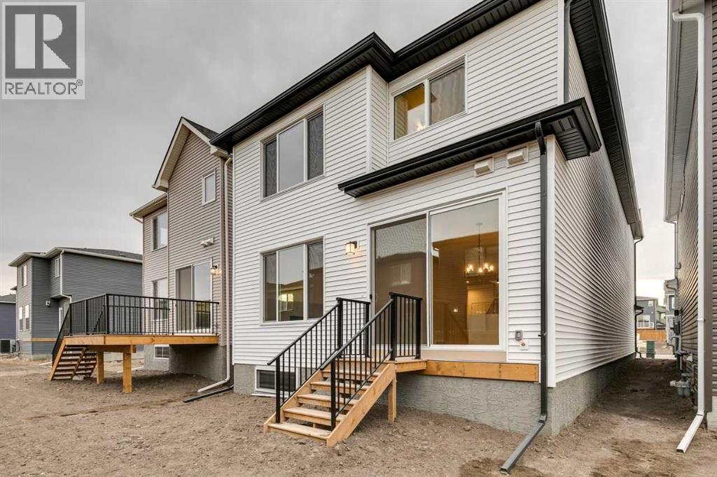 58 Amblefield Common Nw, Calgary, Alberta  T3P 2L5 - Photo 5 - A2294870