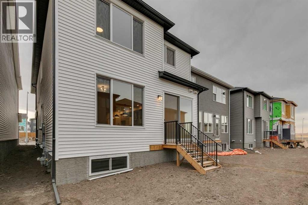 58 Amblefield Common Nw, Calgary, Alberta  T3P 2L5 - Photo 4 - A2294870