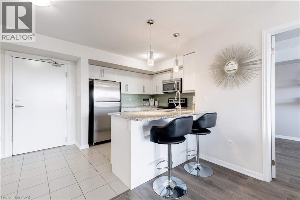 1045 Nadalin Heights Unit# 406, Milton, Ontario  L9T 8R5 - Photo 11 - 40815417