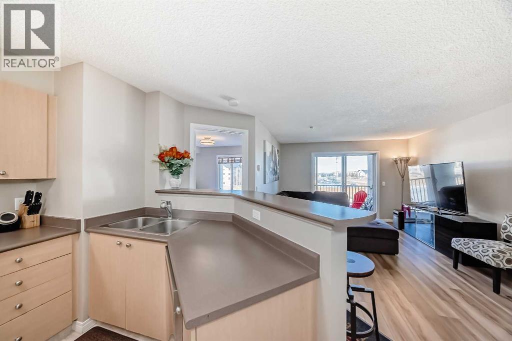 6310, 304 Mackenzie Way SW, Airdrie, Alberta  T4B 3H6 - Photo 7 - A2294862