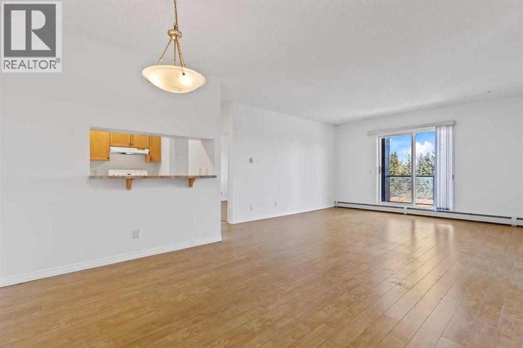 304, 2022 Canyon Meadows Drive Se, Calgary, Alberta  T2J 7H1 - Photo 3 - A2293821