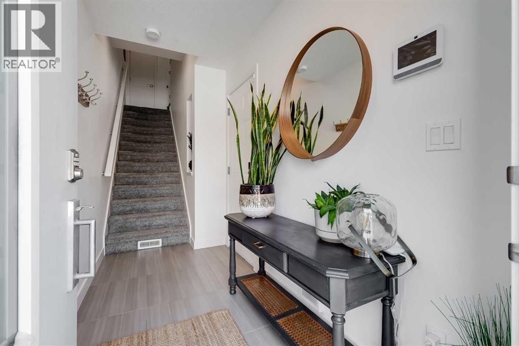 160 Walden Path SE, Calgary, Alberta  T2X 4C4 - Photo 3 - A2293873