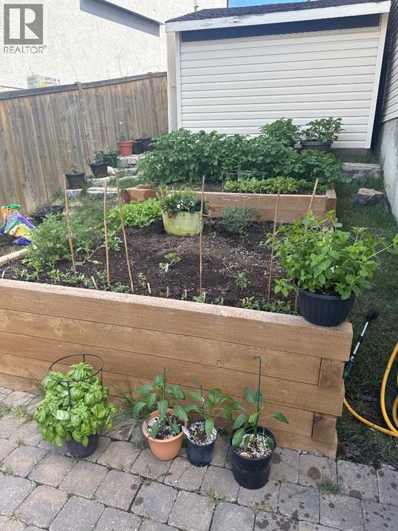 311 Crystal Shores View, Okotoks, Alberta  T1S 2H9 - Photo 45 - A2294700