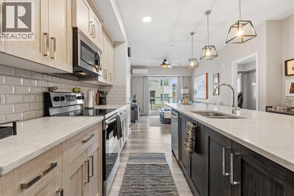 205, 370 Harvest Hills Common, Calgary, Alberta  T3K 2M8 - Photo 2 - A2284598