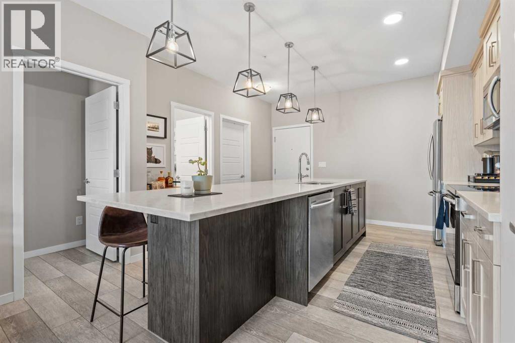 205, 370 Harvest Hills Common, Calgary, Alberta  T3K 2M8 - Photo 4 - A2284598