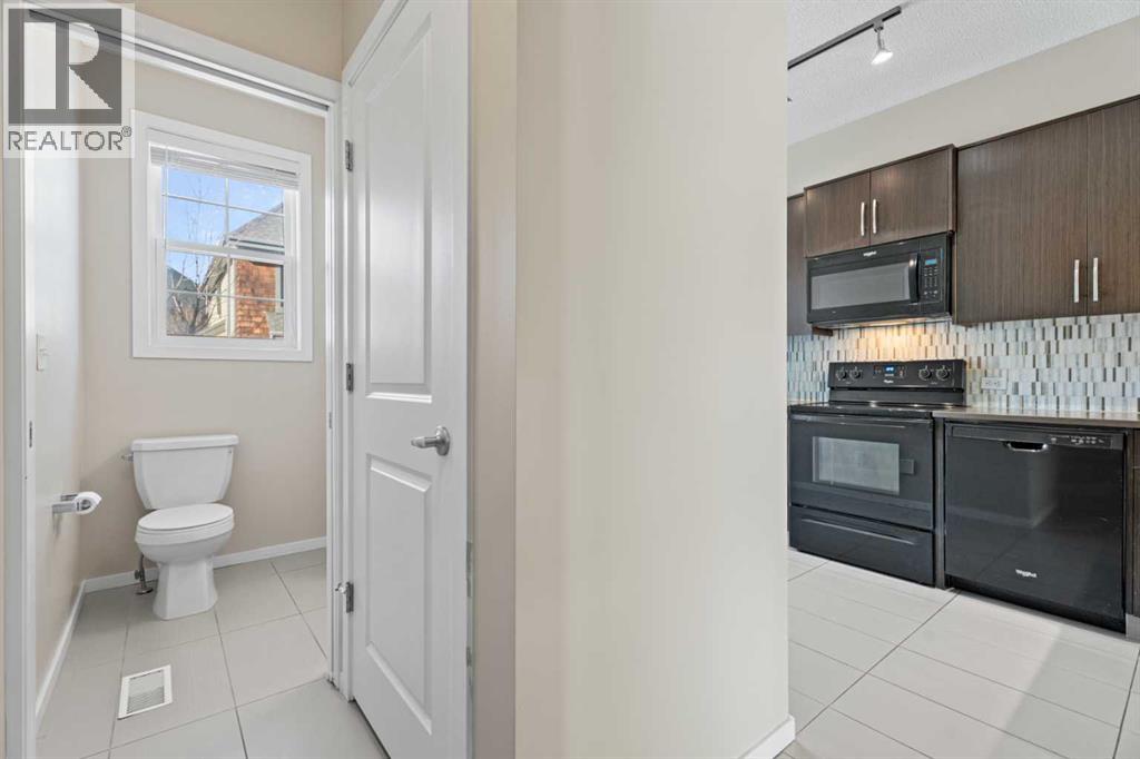 306 Ascot Circle Sw, Calgary, Alberta  T3H 0X2 - Photo 8 - A2294990