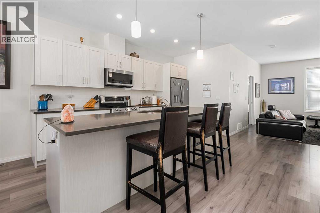 112 South Point Court SW, Airdrie, Alberta  T4B 4K9 - Photo 6 - A2288970