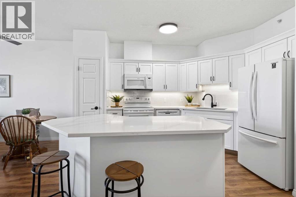 404, 5201 Dalhousie Drive Nw, Calgary, Alberta  T3A 5Y7 - Photo 5 - A2296255