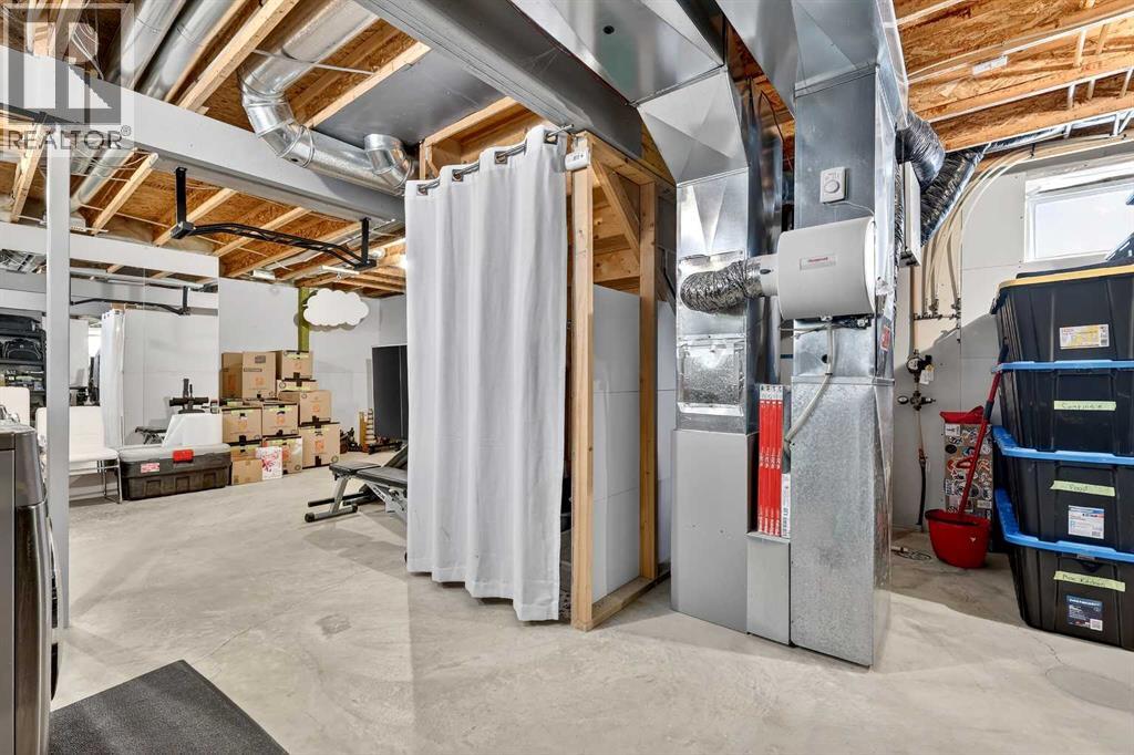 57 Everridge Way SW, Calgary, Alberta  T2Y 4S7 - Photo 34 - A2296795