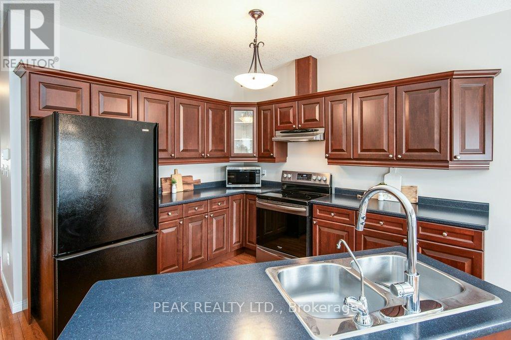 3 - 900 Doon Village Road, Kitchener, Ontario  N2P 1A4 - Photo 19 - X12931470