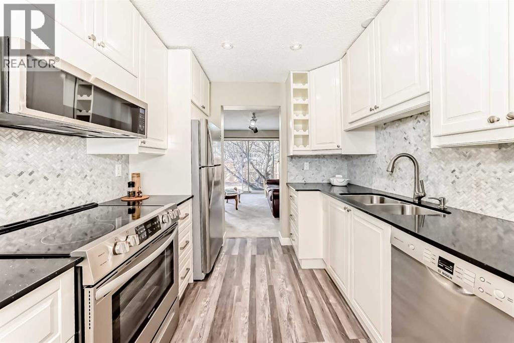 179 Ranchridge Drive Nw, Calgary, Alberta  t3g 1w1 - Photo 5 - A2295815