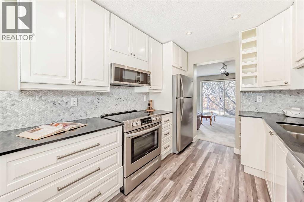 179 Ranchridge Drive Nw, Calgary, Alberta  t3g 1w1 - Photo 6 - A2295815