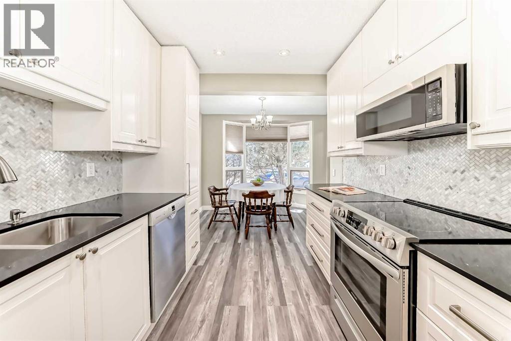 179 Ranchridge Drive Nw, Calgary, Alberta  t3g 1w1 - Photo 7 - A2295815