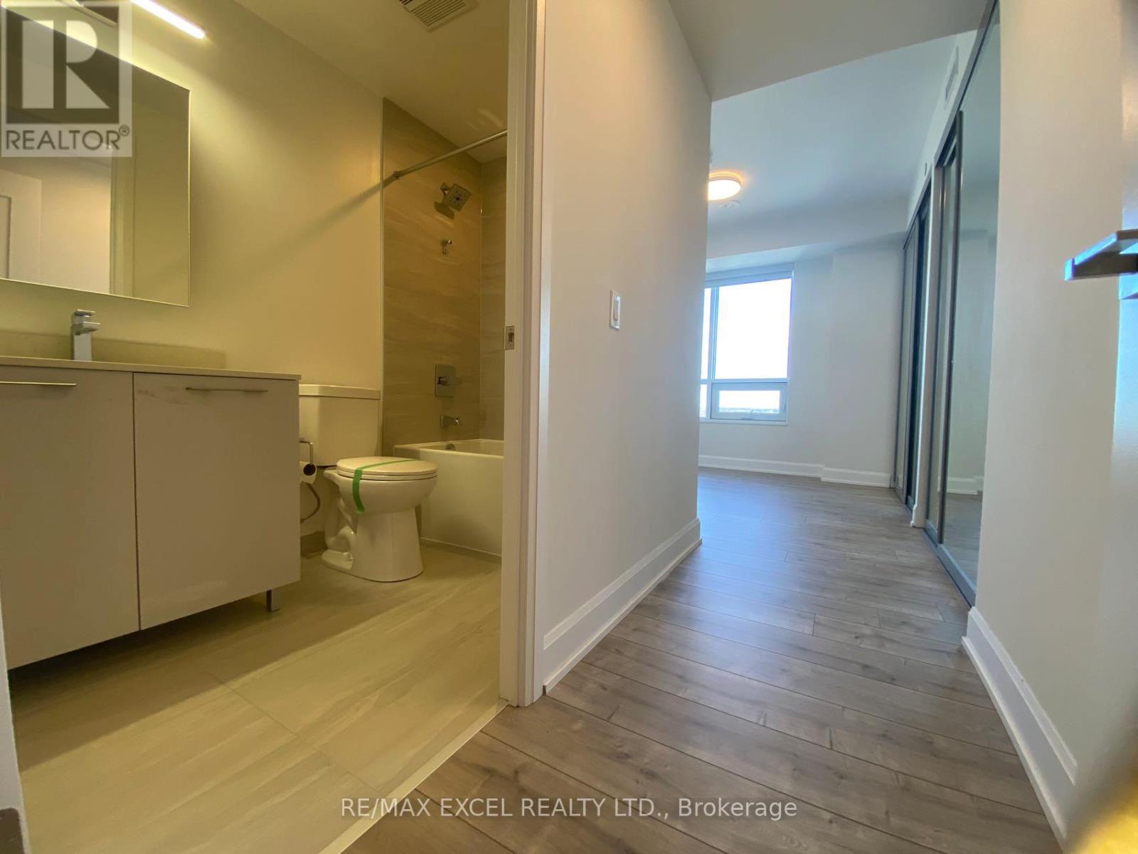 2001 - 38 Water Walk Drive, Markham, Ontario L3R 6M8 - Photo 12 - N12931492