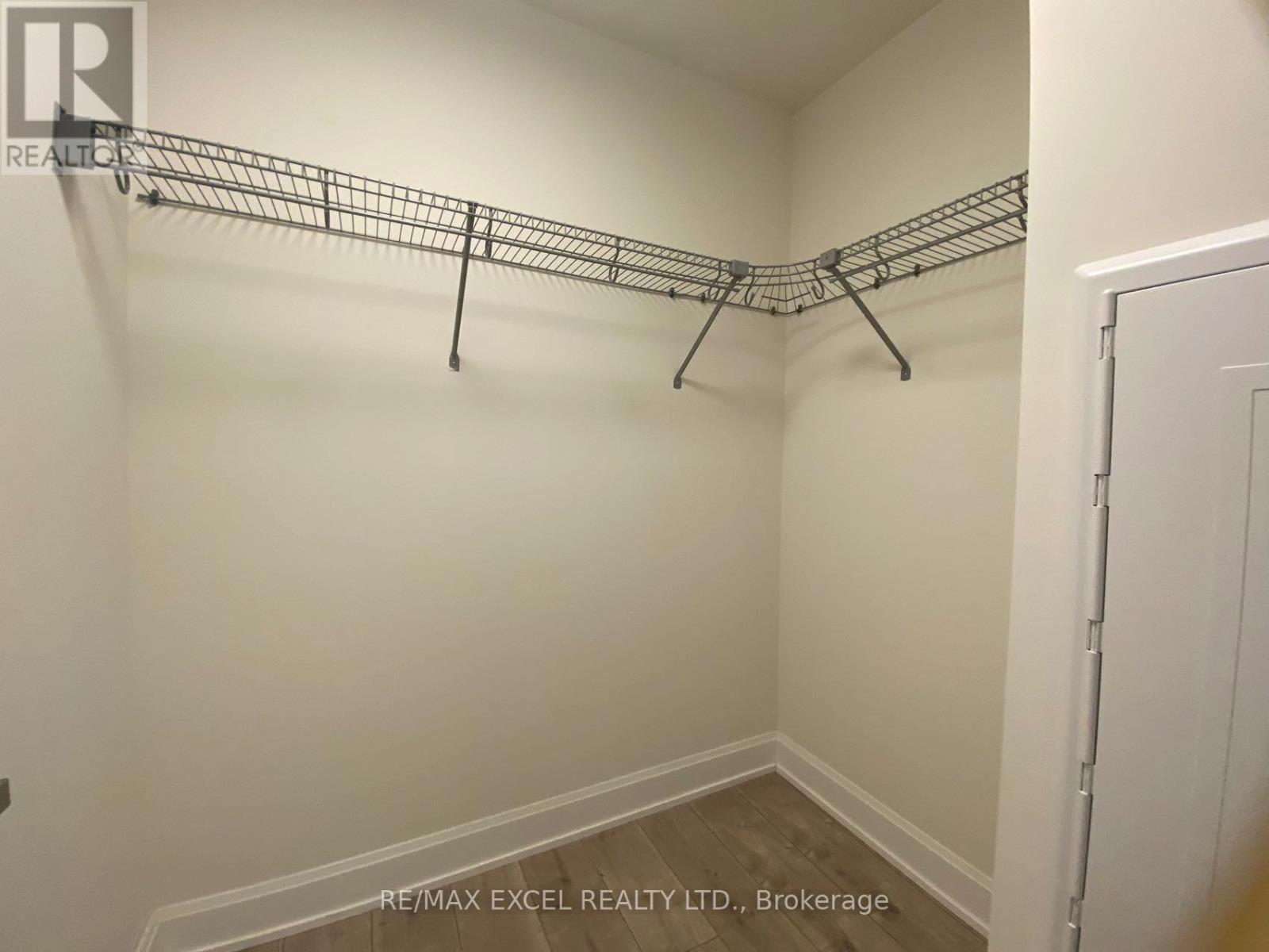 2001 - 38 Water Walk Drive, Markham, Ontario L3R 6M8 - Photo 6 - N12931492