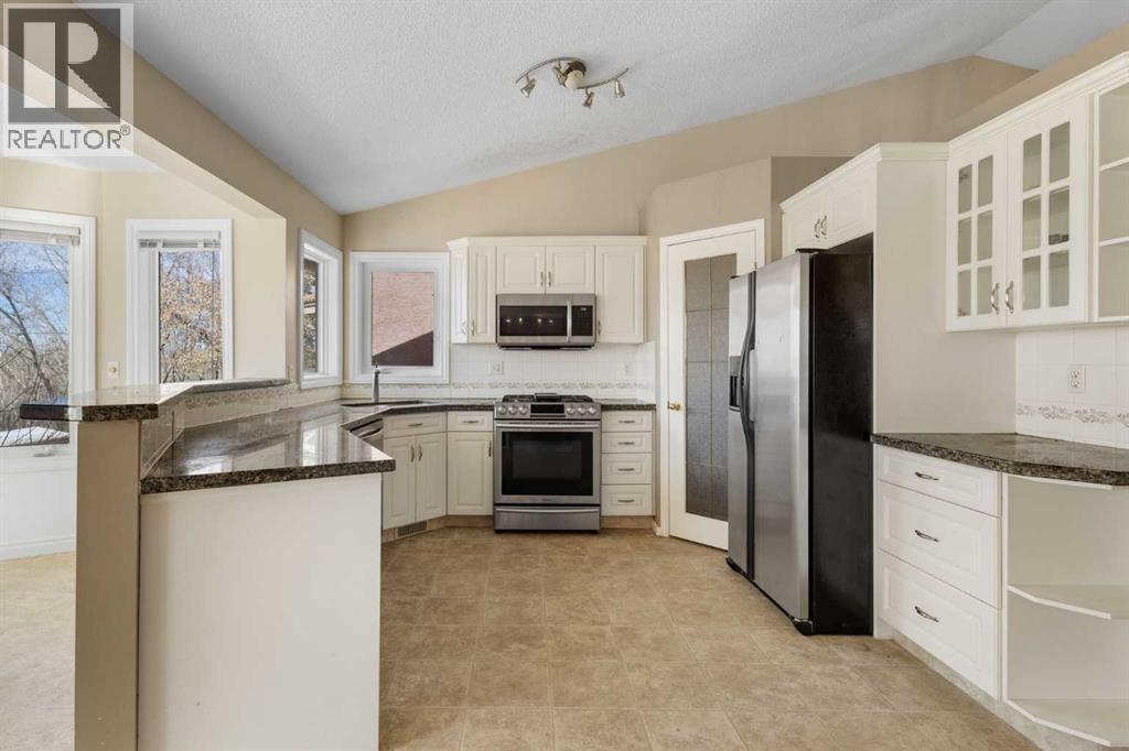 103 Riverside Way Se, Calgary, Alberta  T2C 3V8 - Photo 8 - A2295313