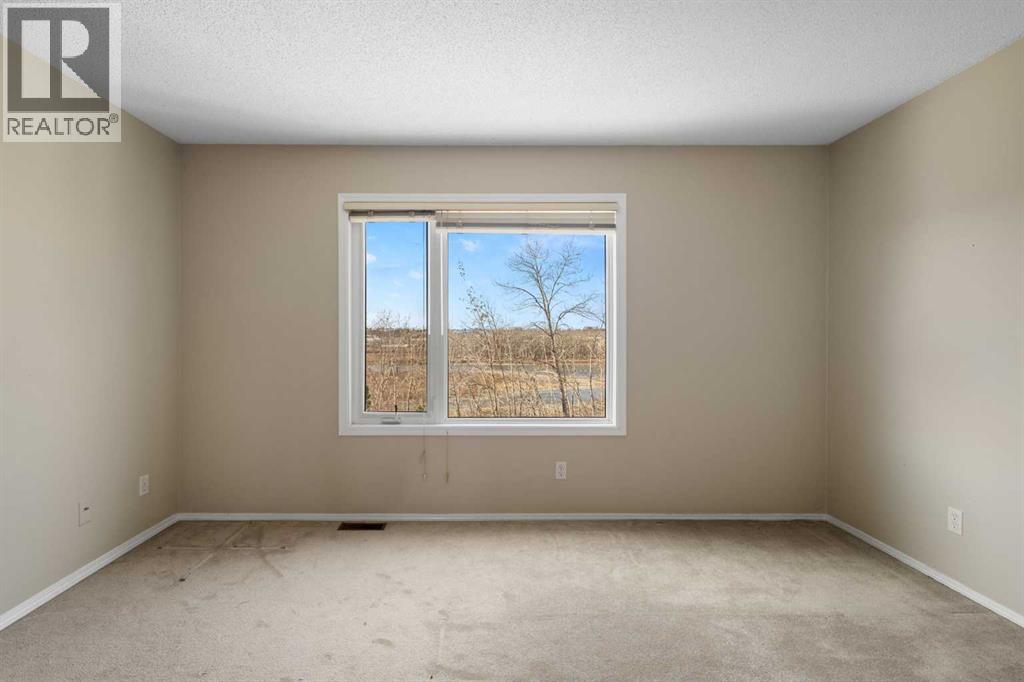 103 Riverside Way Se, Calgary, Alberta  T2C 3V8 - Photo 25 - A2295313