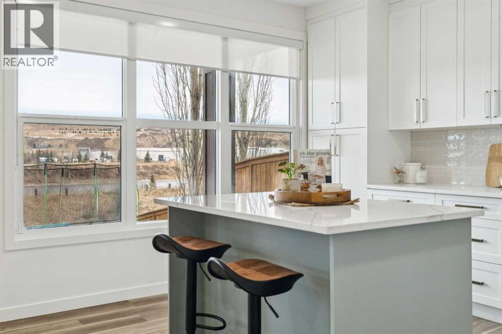 50 Riviera View, Cochrane, Alberta  T4C 0Y7 - Photo 4 - A2294624