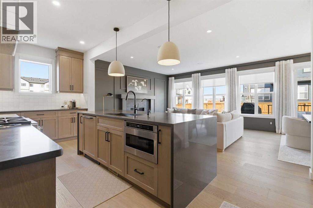 42 Creekside Avenue SW, Calgary, Alberta  T2X 4A9 - Photo 2 - A2285114