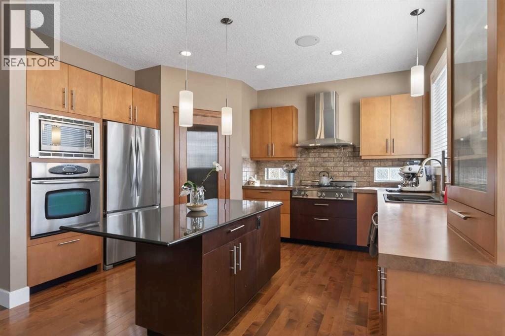 106 Montenaro Crescent, Rural Rocky View County, Alberta  T4C 1A5 - Photo 6 - A2285057