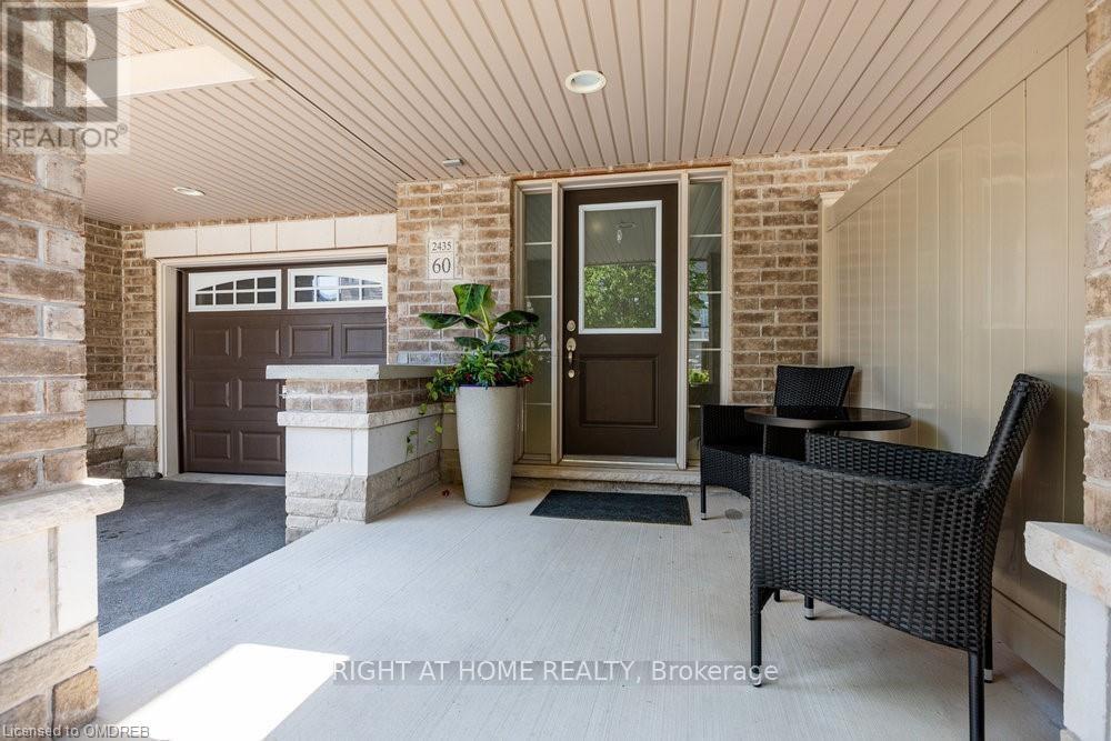 60 - 2435 Greenwich Drive, Oakville, Ontario  L6M 0S4 - Photo 2 - W12932048