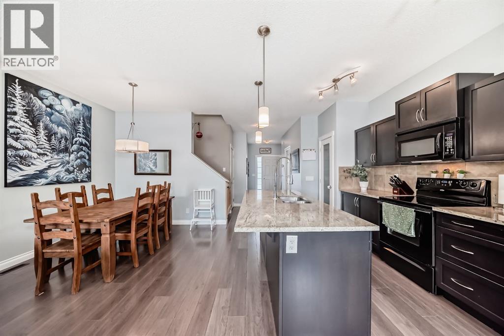 10 Reunion Grove Nw, Airdrie, Alberta  T4B 0Z7 - Photo 7 - A2292885