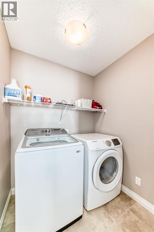 10 Reunion Grove Nw, Airdrie, Alberta  T4B 0Z7 - Photo 24 - A2292885