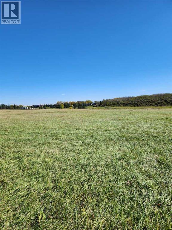 32079 Willow Way, Rural Rocky View County, Alberta  T4C 2Y4 - Photo 2 - A2297217