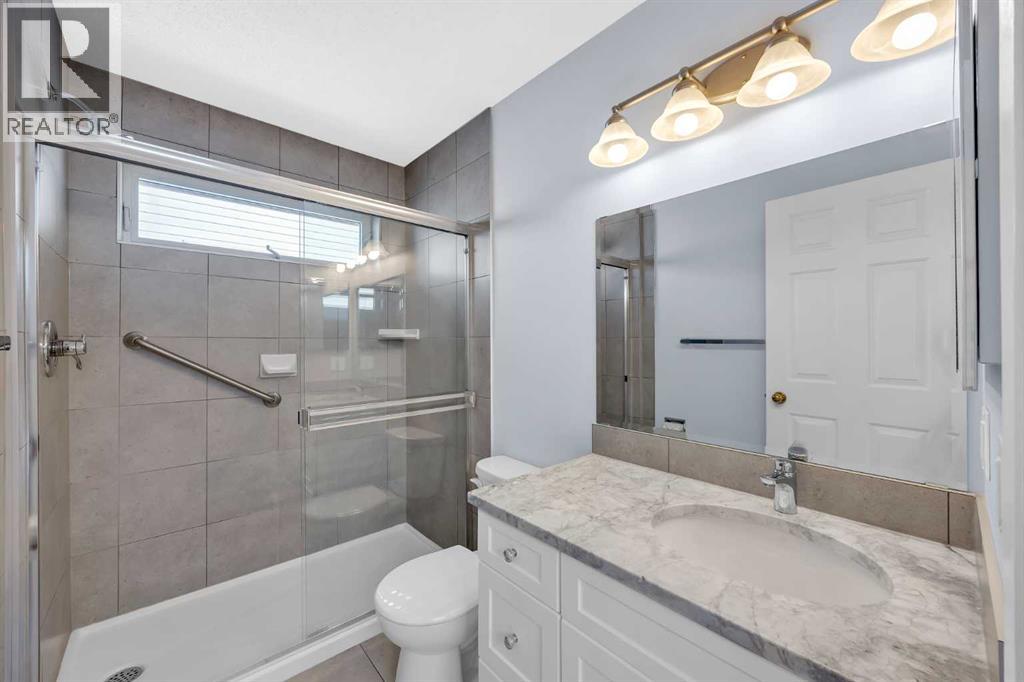 40 Cedargrove Way Sw, Calgary, Alberta  T2W 4V1 - Photo 37 - A2292650