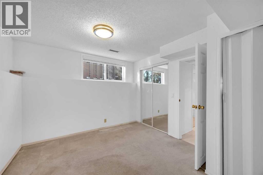 40 Cedargrove Way Sw, Calgary, Alberta  T2W 4V1 - Photo 40 - A2292650