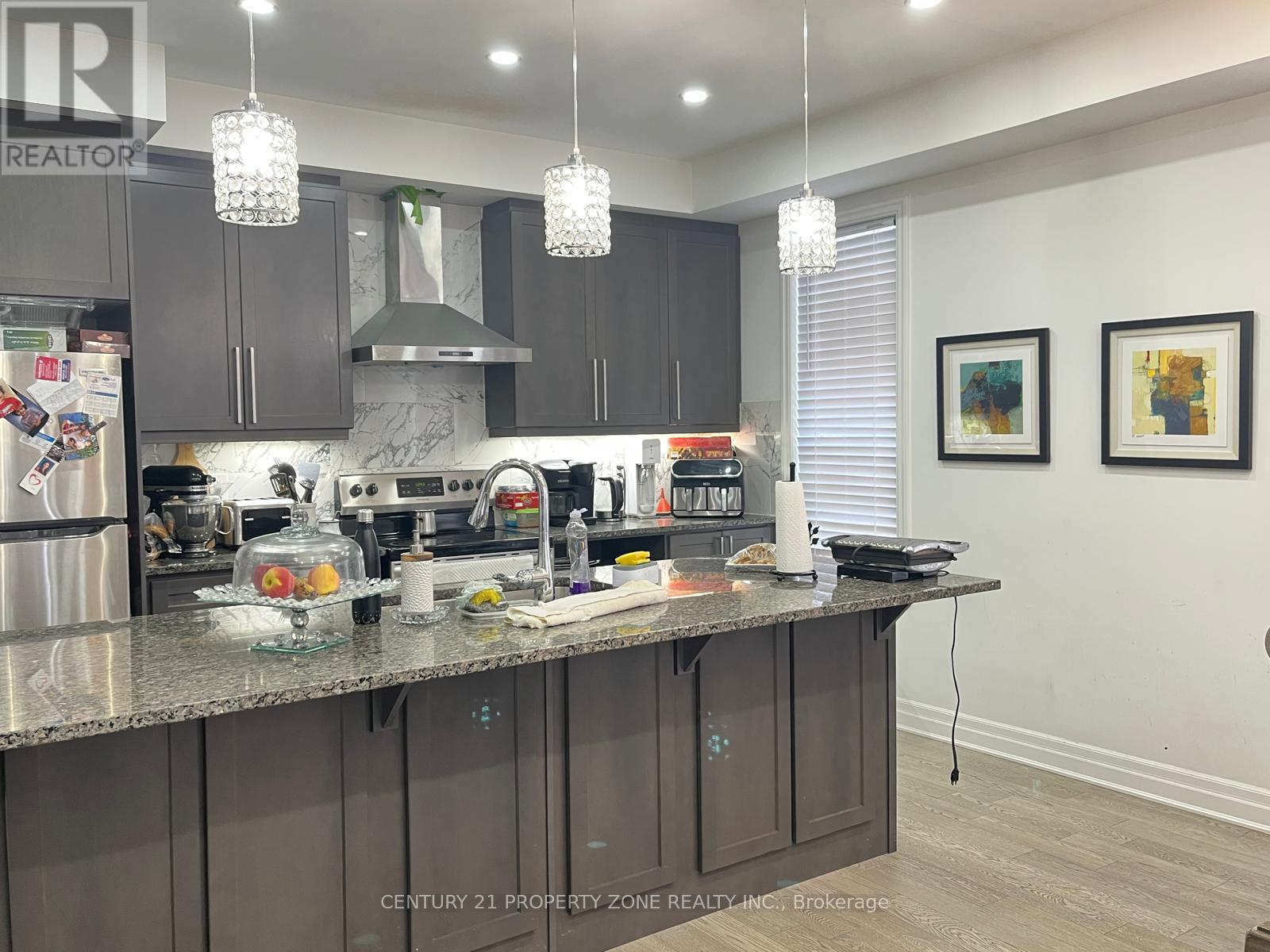 1216 Wheat Boom Drive, Oakville, Ontario  L6H 7W4 - Photo 6 - W12921270