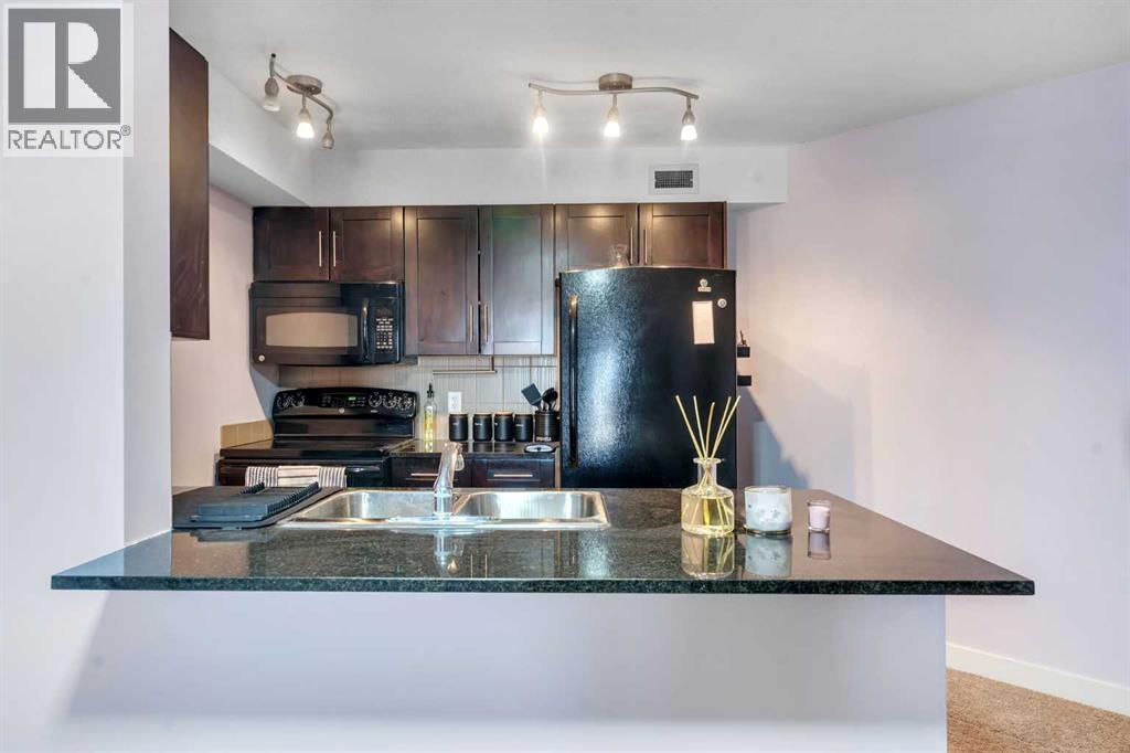 318, 7210 80 Avenue NE, Calgary, Alberta  T3J 0n7 - Photo 18 - A2293337