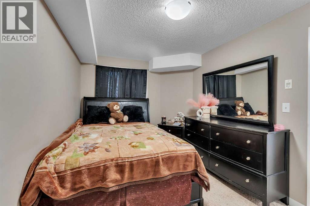 318, 7210 80 Avenue NE, Calgary, Alberta  T3J 0n7 - Photo 21 - A2293337